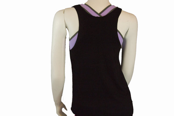 The tank is layered with the X Buudah Sports bra, soon to be released.